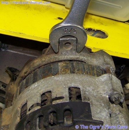 Use a 3/4 inch wrench to tighten the belt.